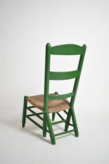 Green painted wood and straw fireside chair, 1960s.
