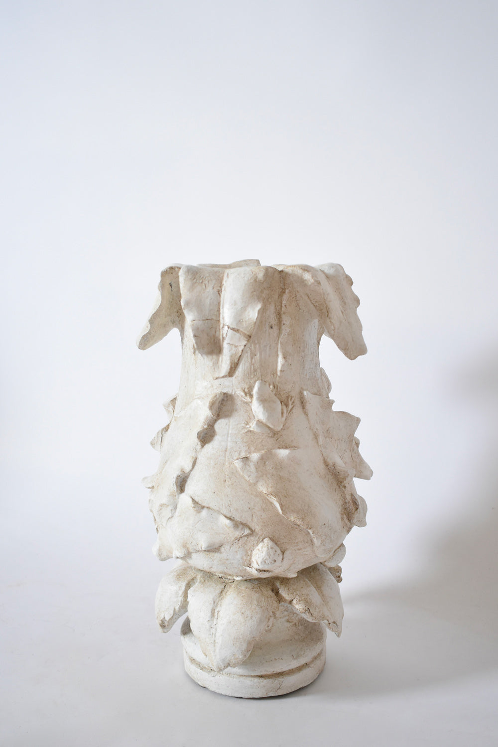 Plaster vase with floral pattern, 1920s.