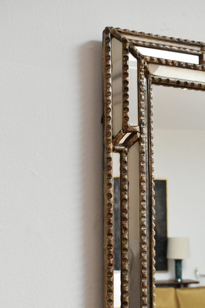 Giltwood and patinated-wood mirror, 1940s.