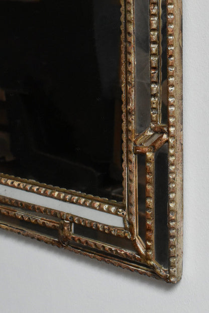 Giltwood and patinated-wood mirror, 1940s.