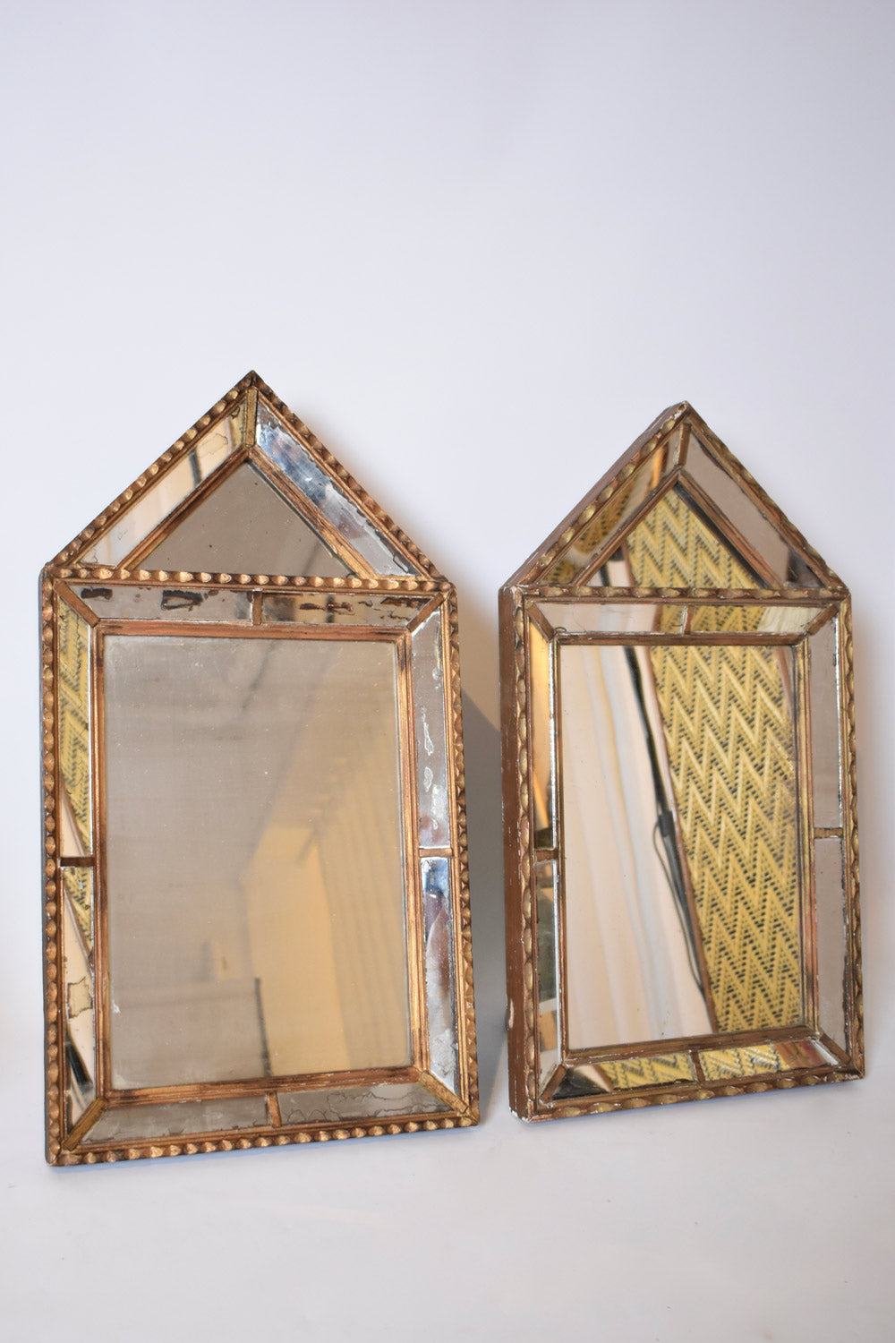 Pair of Pierre Dariel dit Dolt pedestal mirror, 1940s.