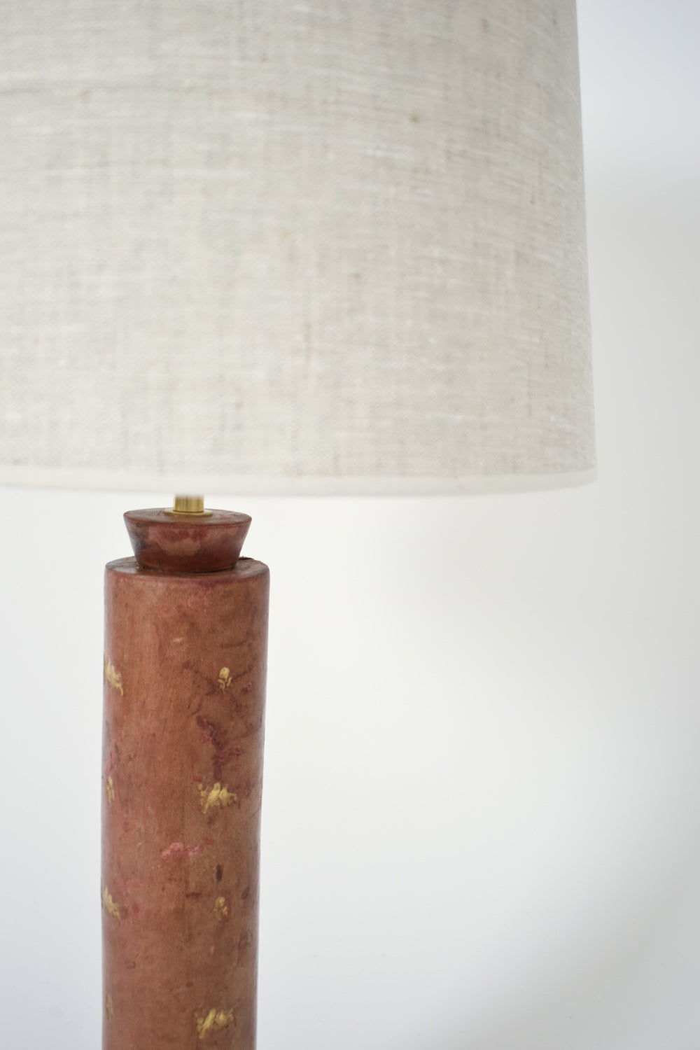 Cylindrical red leather covered lamp, 1940s.