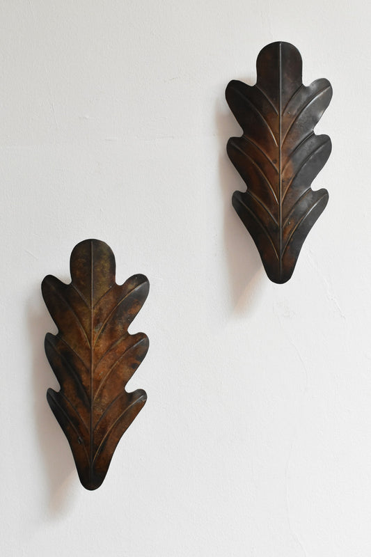 Pair of painted metal acanthus leaf wall sconces, 1970s.
