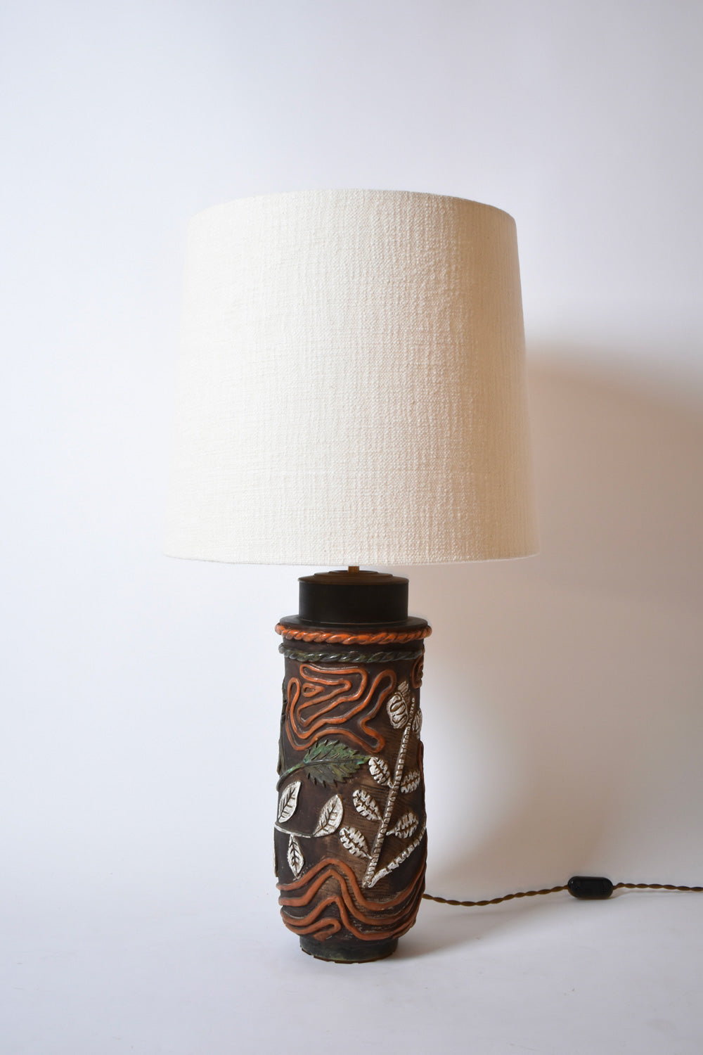 Cylindrical foliage pattern ceramic lamp, 1960s.