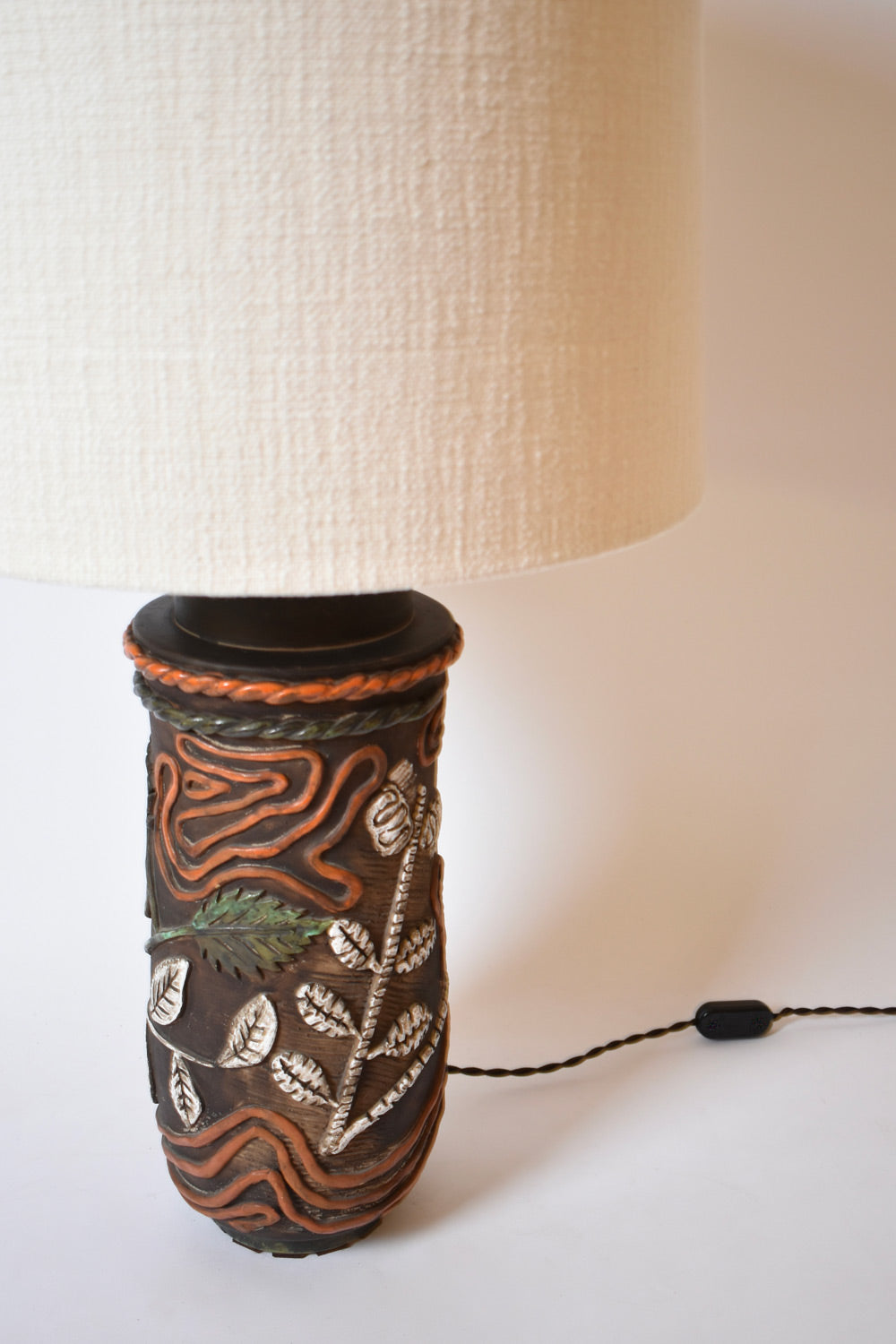 Cylindrical foliage pattern ceramic lamp, 1960s.