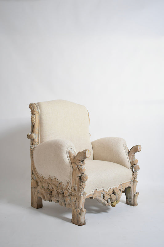 Carved limed oak fruits and foliage armchair, 1970s.