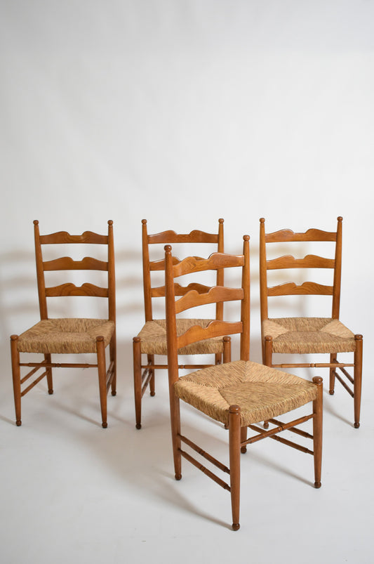 Set of four wooden and straw chairs, 1940s.