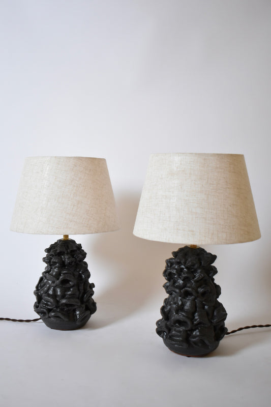 Pair of black mat organic lamps by Helder, 2024.