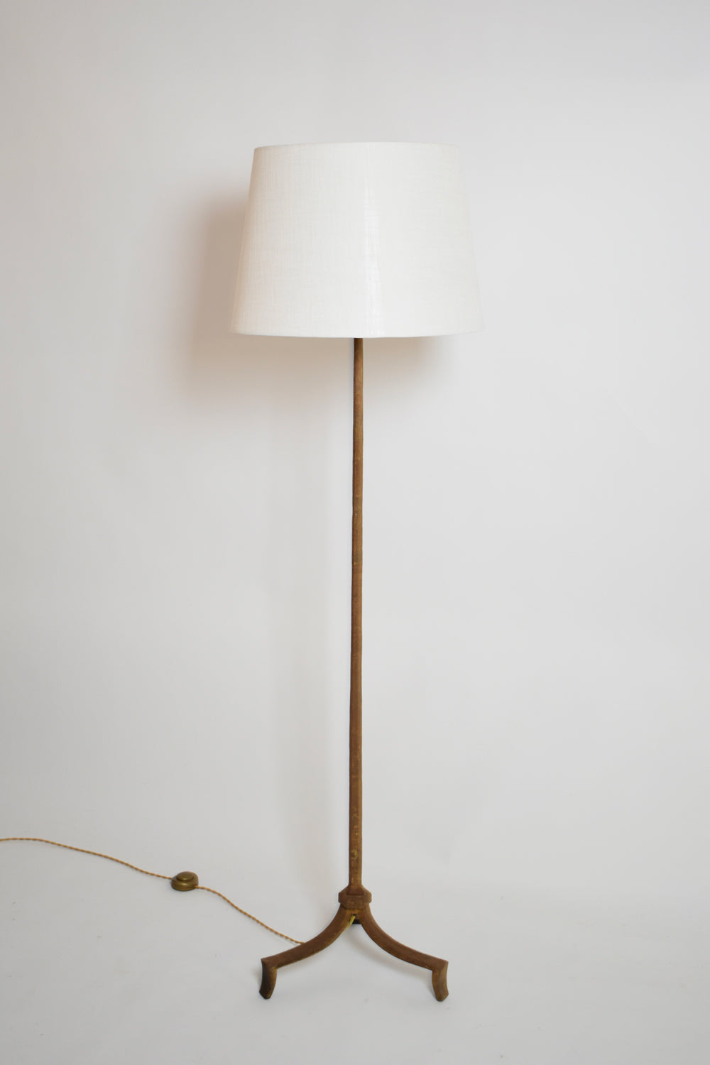 Ramsay tripod wrought iron floor lamp, 1960s.