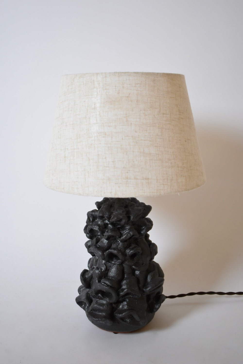 Pair of black mat organic lamps by Helder, 2024.
