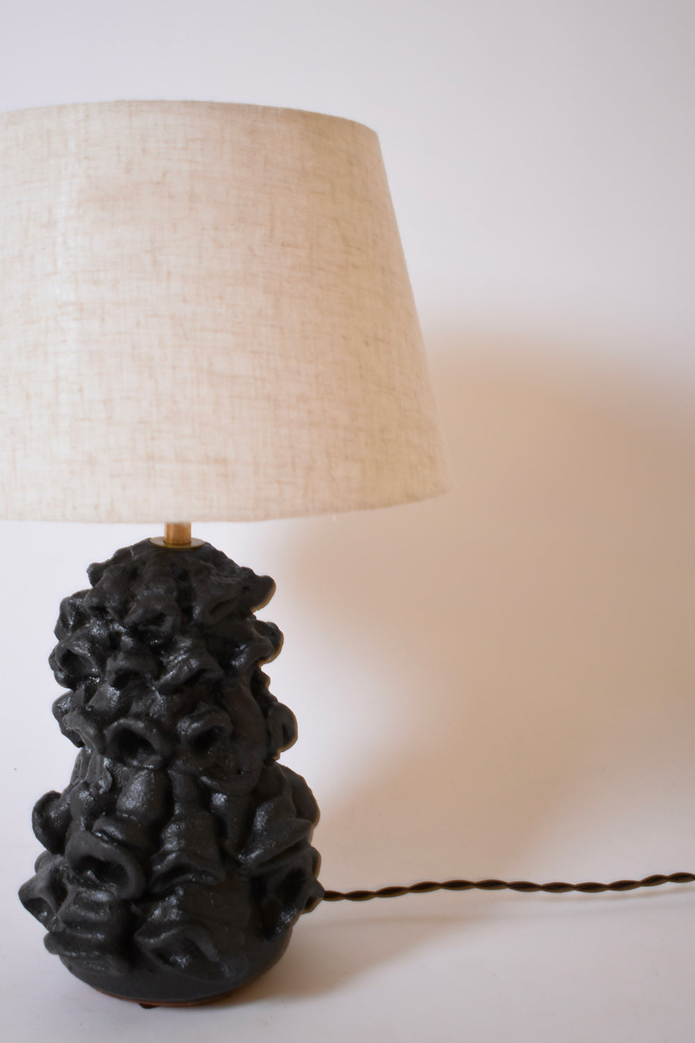 Pair of black mat organic lamps by Helder, 2024.