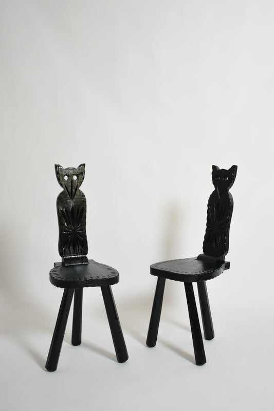 Pair of brutalist ebonised wood owl chairs, 1960s.