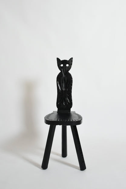 Pair of brutalist ebonised wood owl chairs, 1960s.