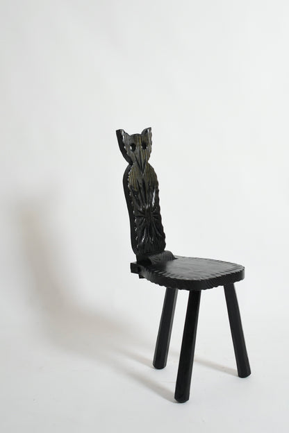 Pair of brutalist ebonised wood owl chairs, 1960s.