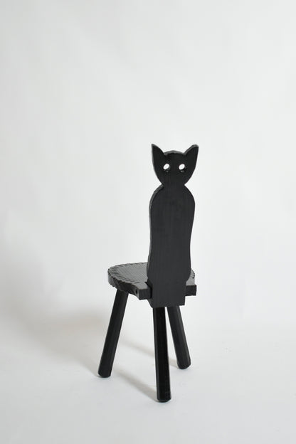 Pair of brutalist ebonised wood owl chairs, 1960s.