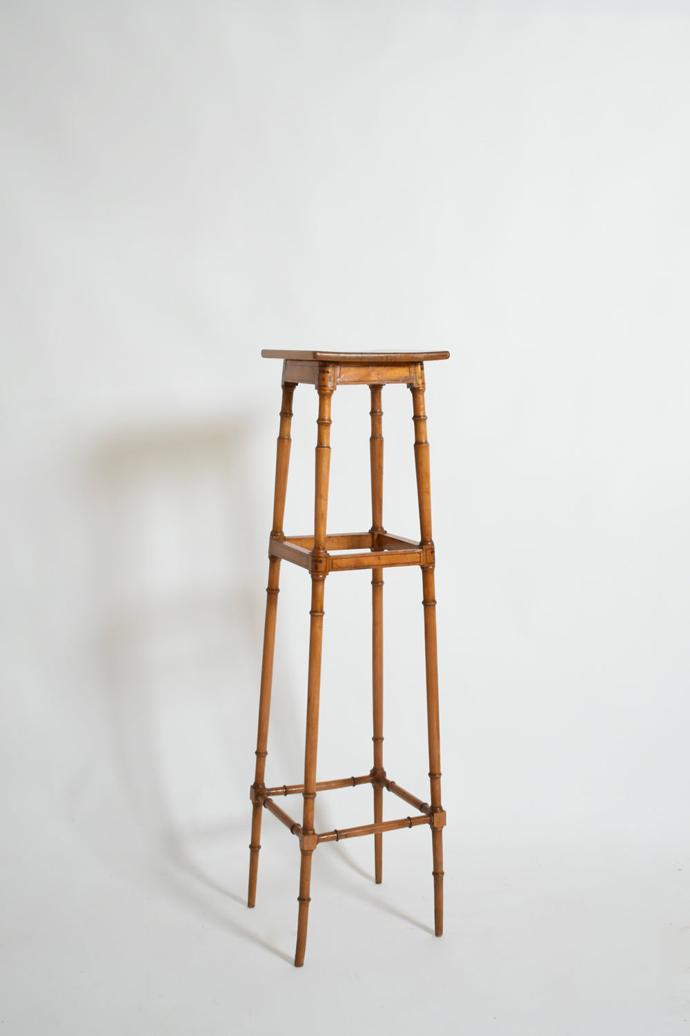 Light wood faux bamboo pedestal table, 1900s.