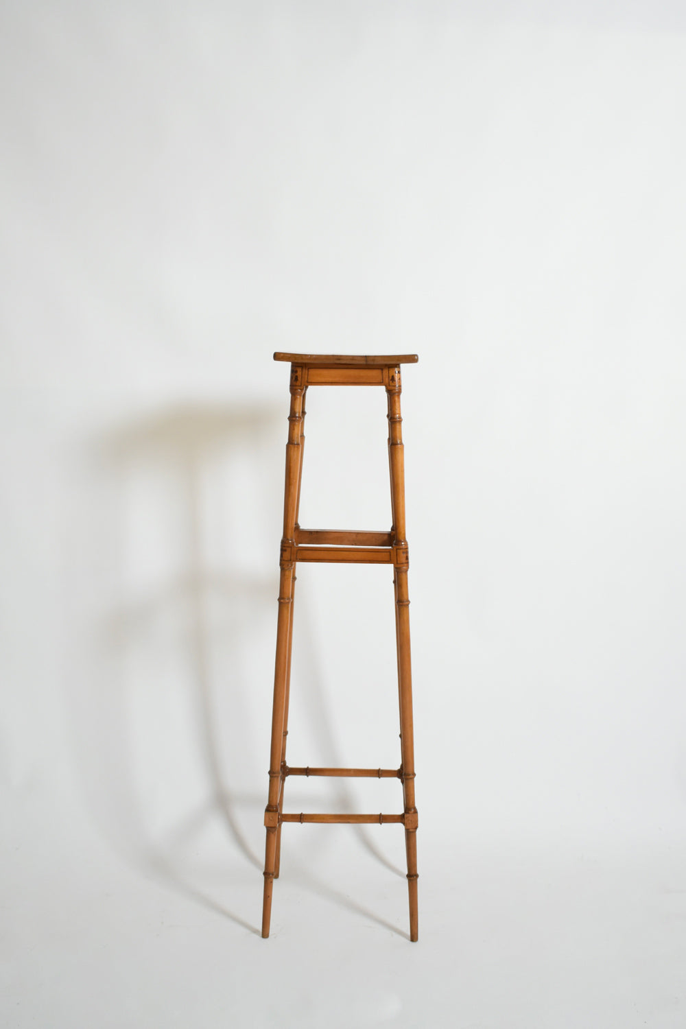 Light wood faux bamboo pedestal table, 1900s.
