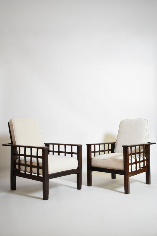 Pair of large Francis Jourdain style reclinable armchairs, 1930s.