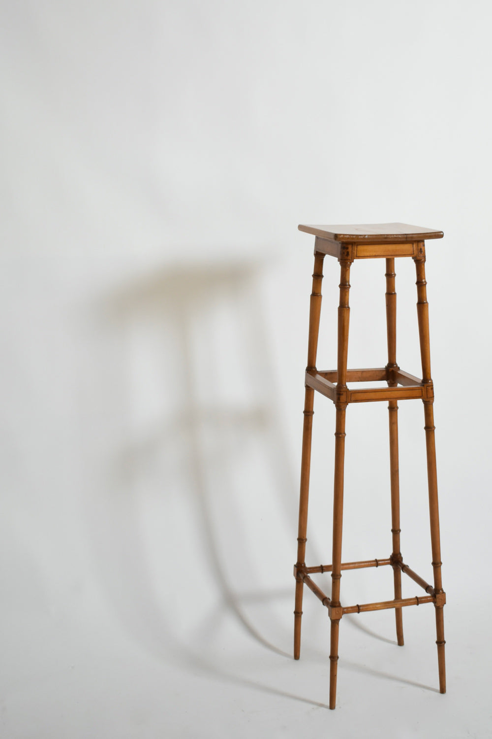 Light wood faux bamboo pedestal table, 1900s.