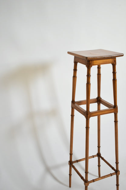Light wood faux bamboo pedestal table, 1900s.