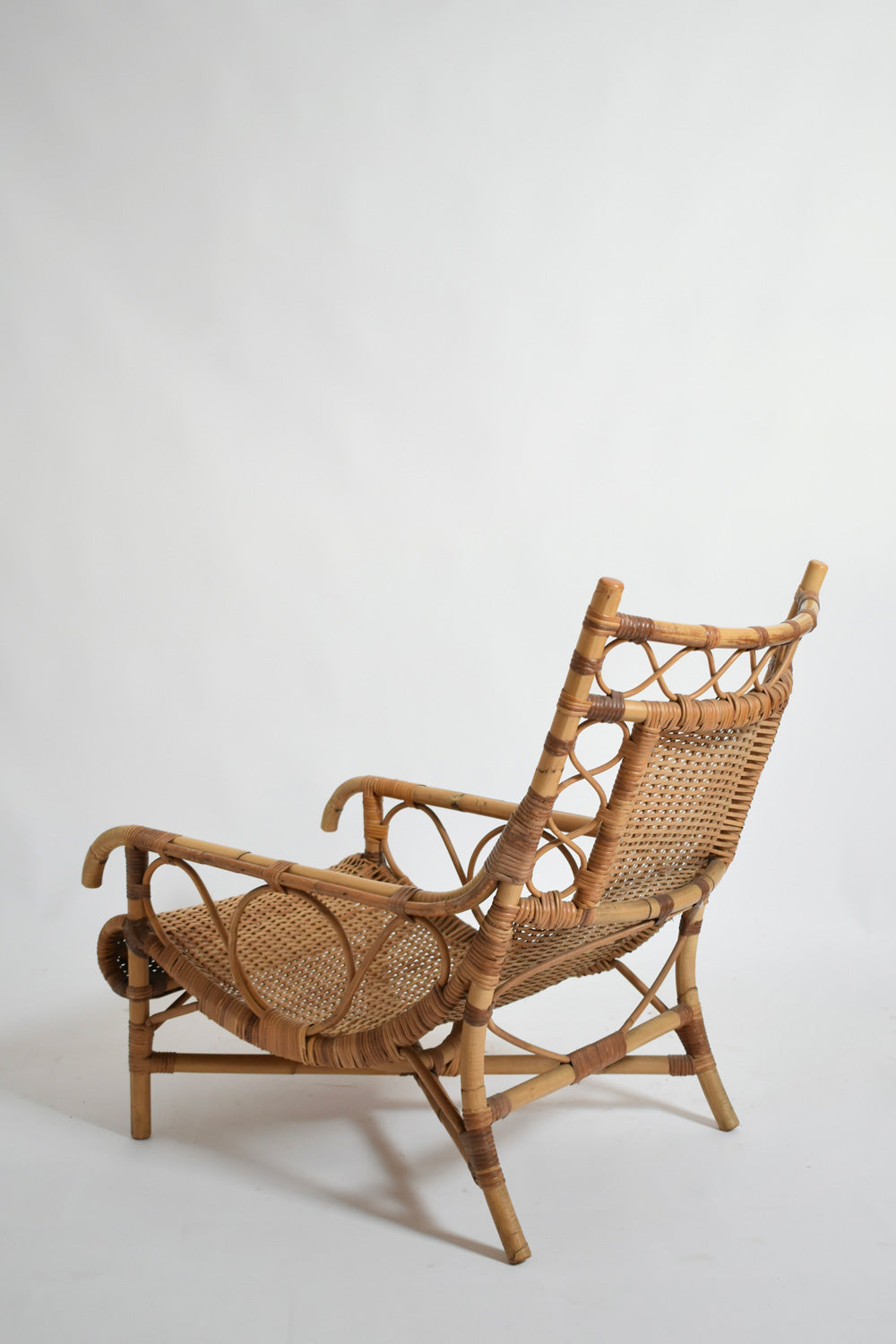 Rattan low armchair, 1950s.