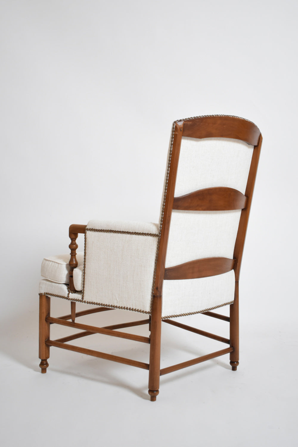 Pair of bergère armchairs, 1950s.