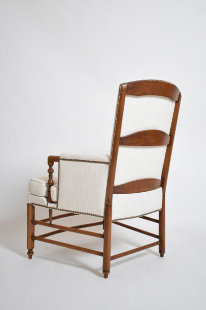 Pair of bergère armchairs, 1950s.