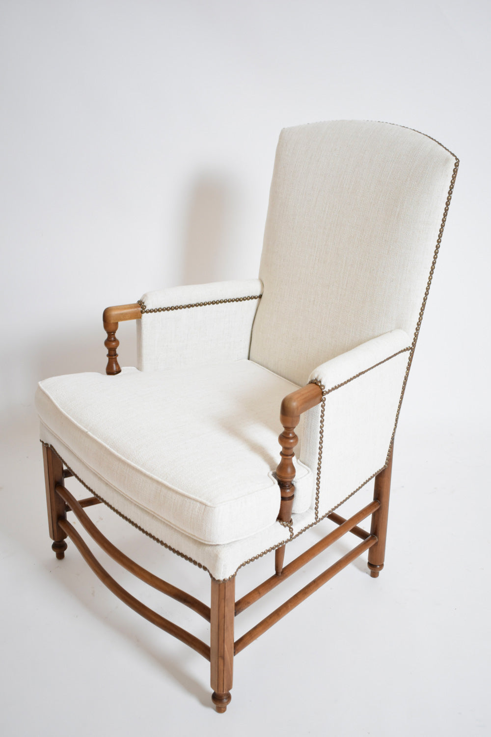 Pair of bergère armchairs, 1950s.