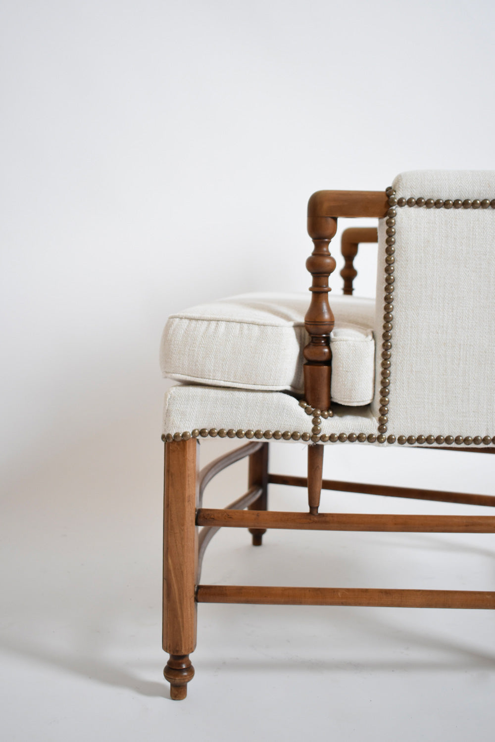 Pair of bergère armchairs, 1950s.