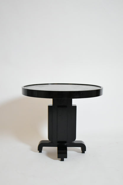 Round ebonised art deco geometric side table, 1930s.