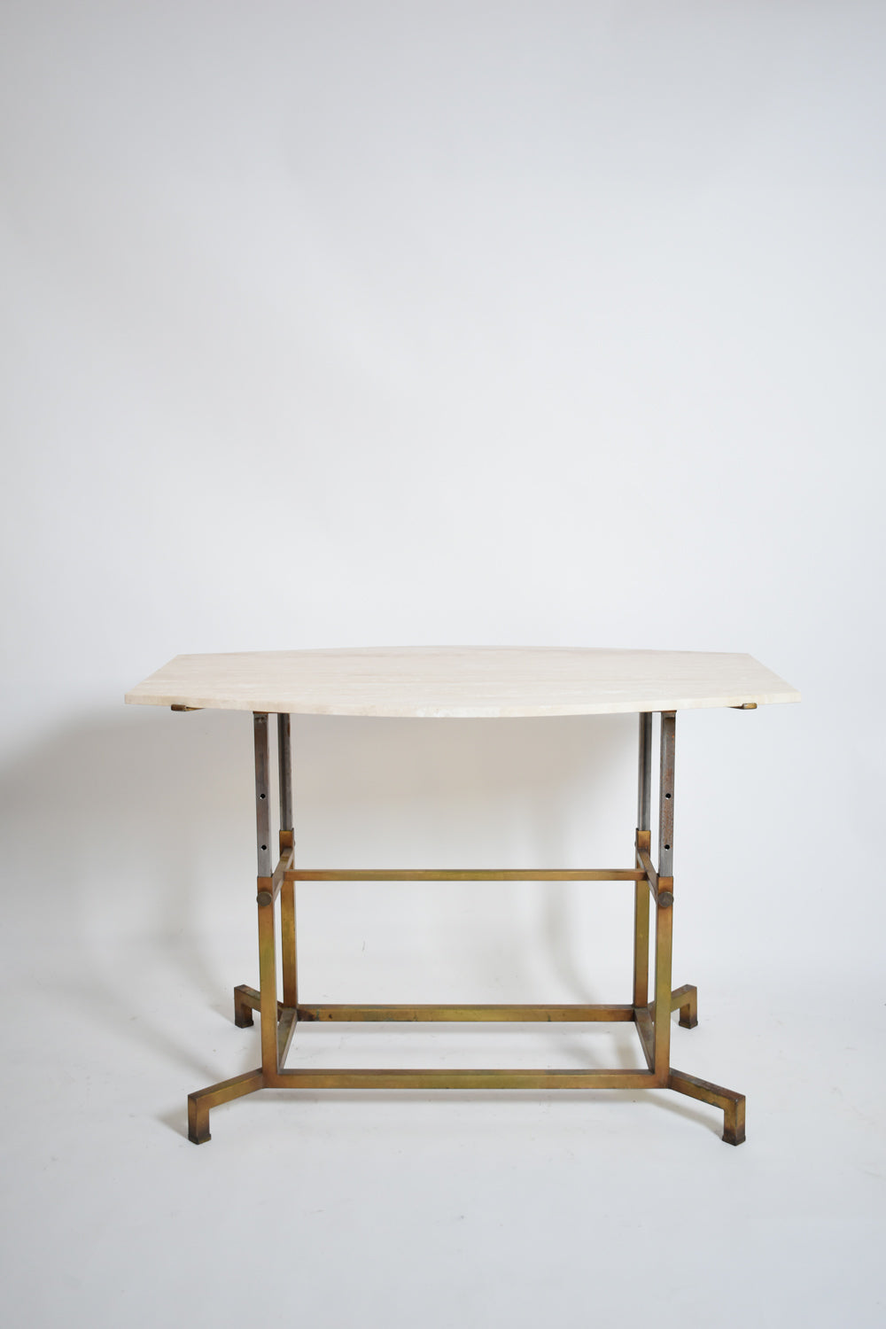 Golden iron and iron and travertine table, 1970s.