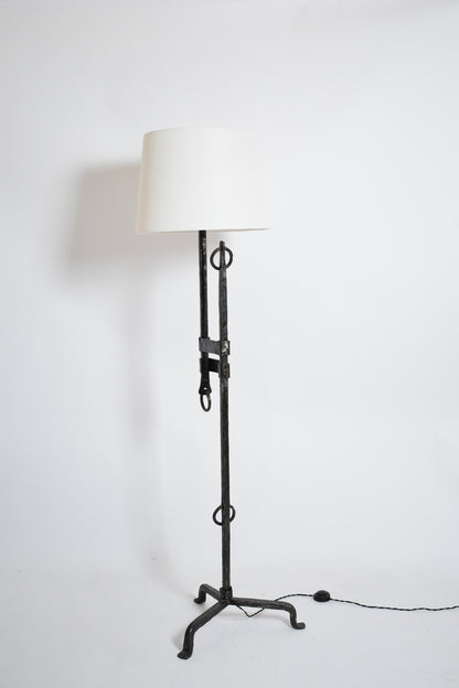 Tripod wrought iron adjustable floor lamp, 1950s.