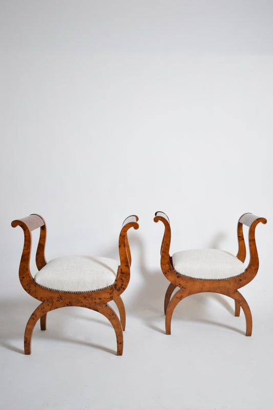 Pair of walnut curule stools, XIXth.