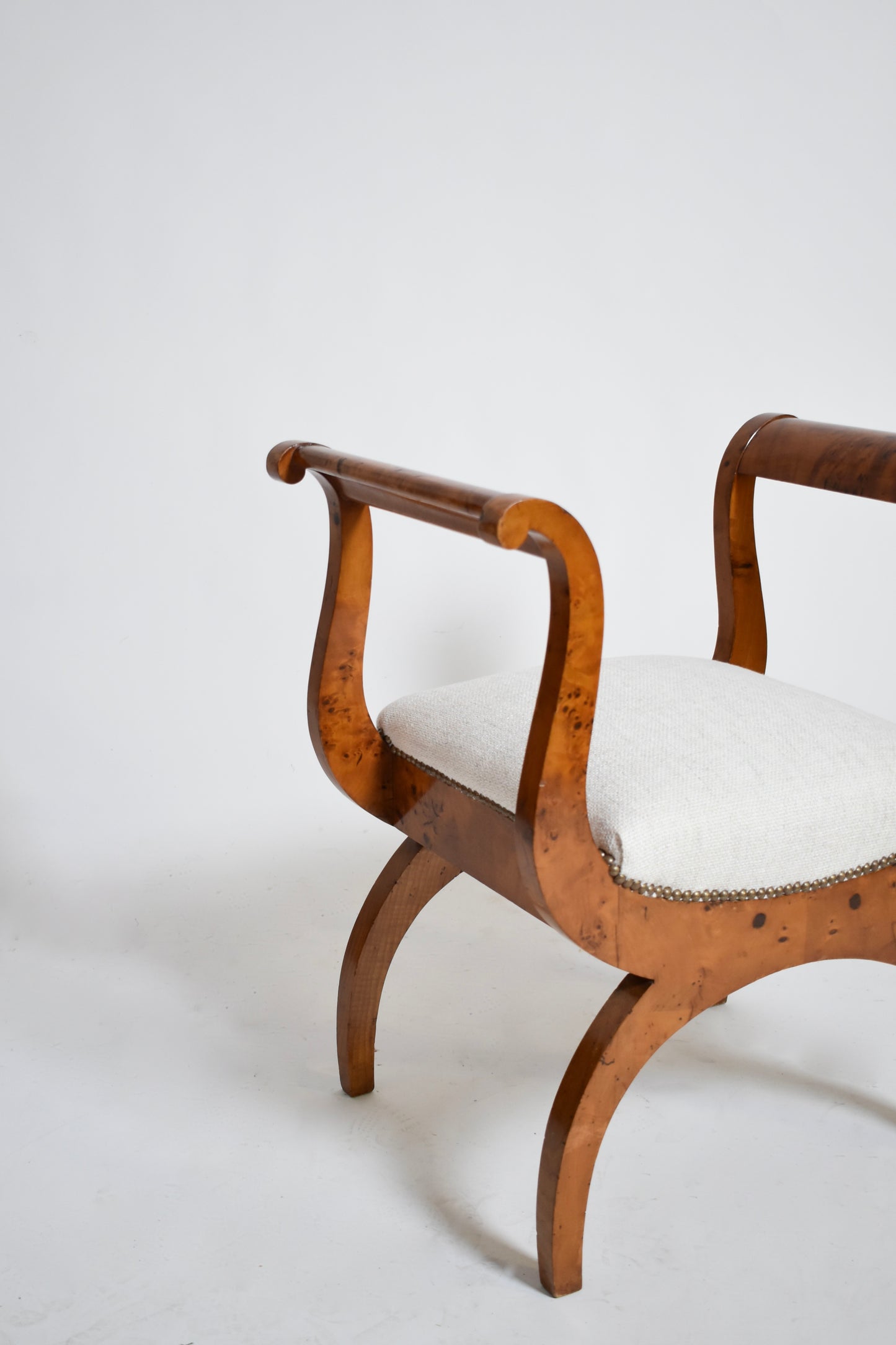 Pair of walnut curule stools, XIXth.