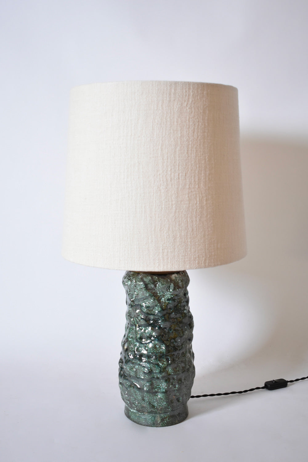 Organic shape green ceramic lamp Helder, 2025.