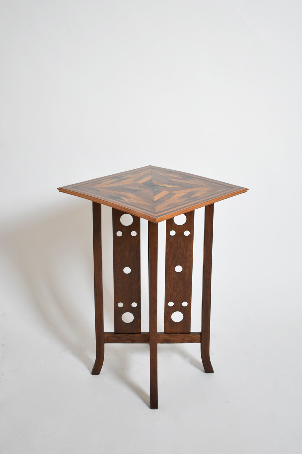 Japonese style geometric marquetry side table, 1920s.
