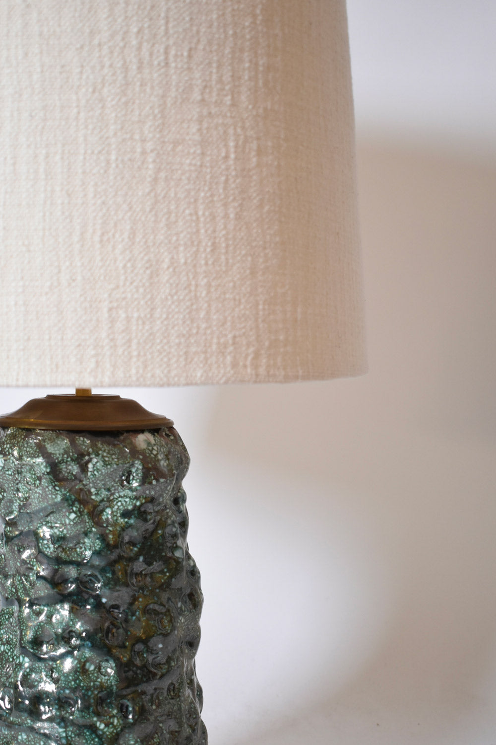 Organic shape green ceramic lamp Helder, 2025.