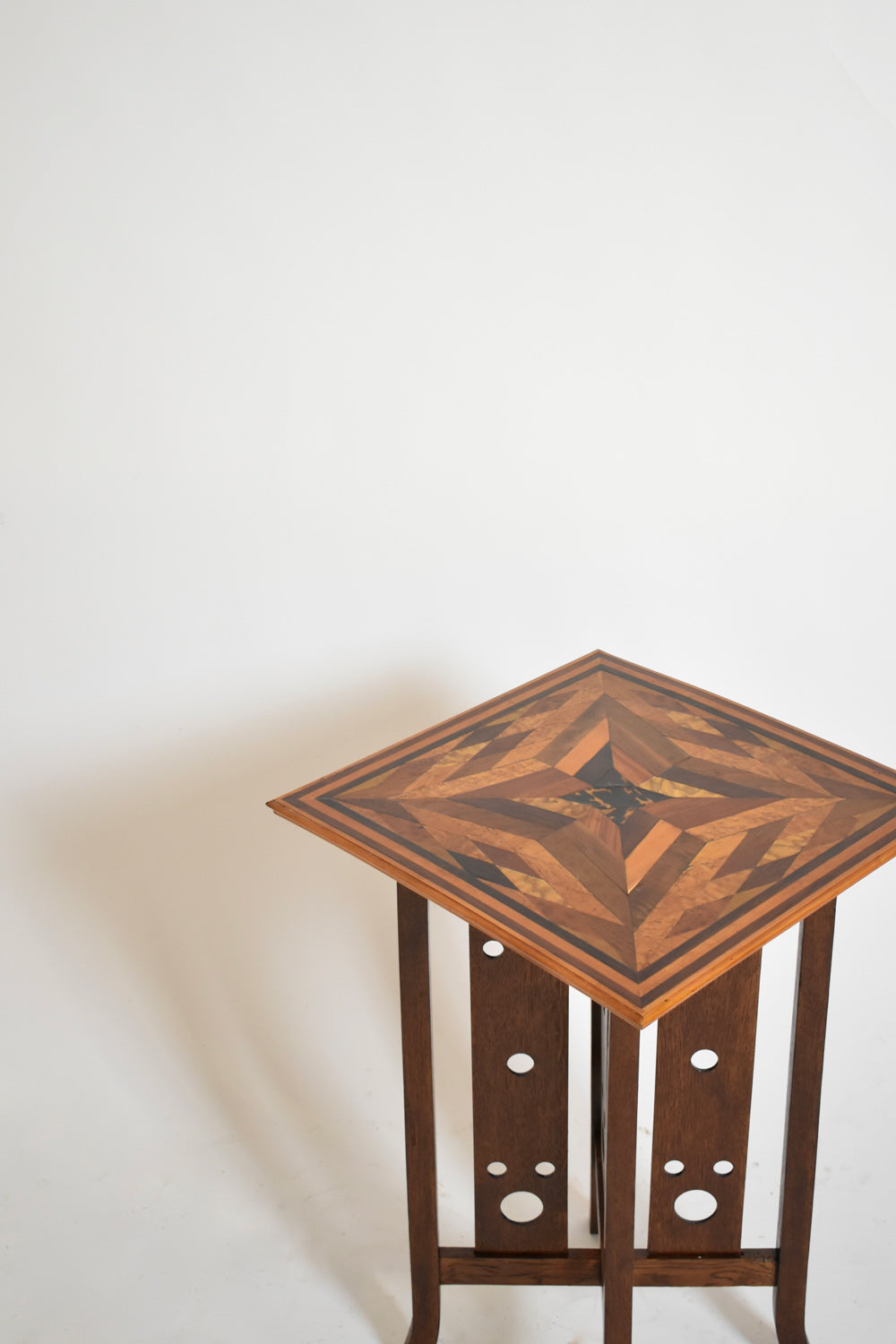 Japonese style geometric marquetry side table, 1920s.