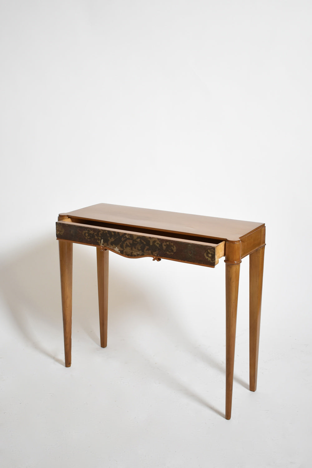 Natural wood and lacquered console, 1940s.