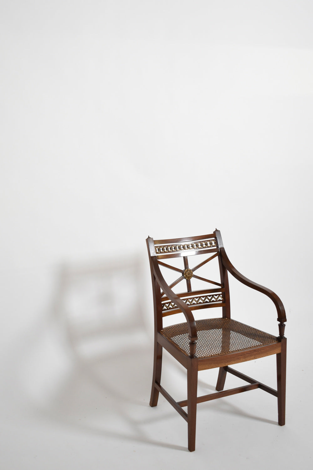 Pair of neoclassical mahogany and canning armchairs, XIXth c.