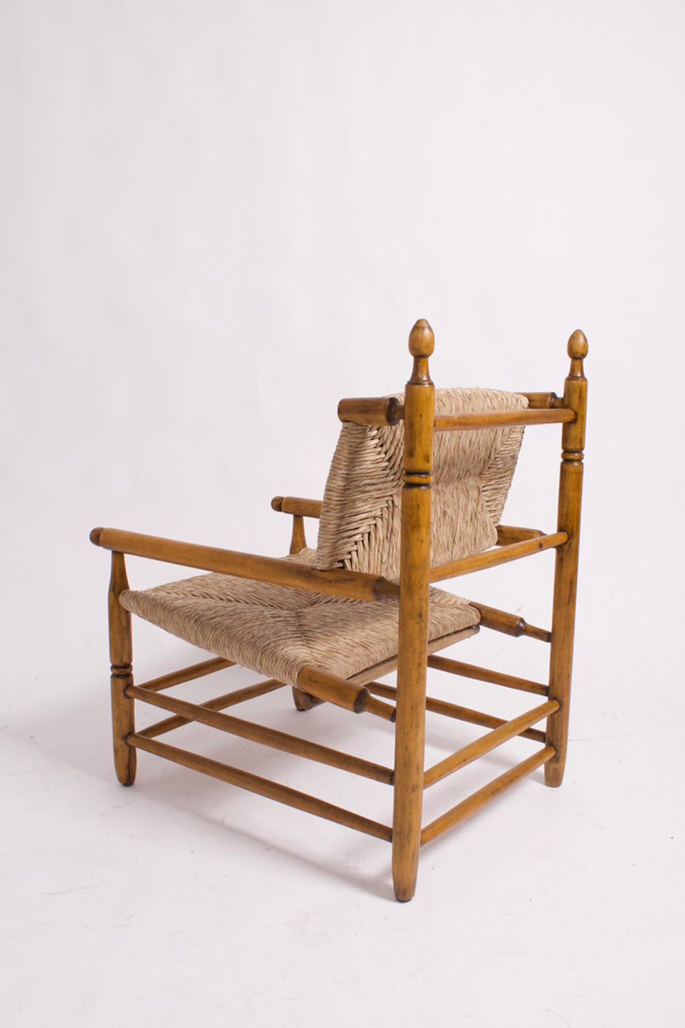 Pair of turned wood and straw armchairs, 1950s.