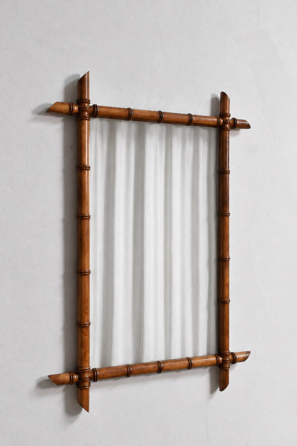 Pair of wooden faux bamboo mirrors, 1920s.