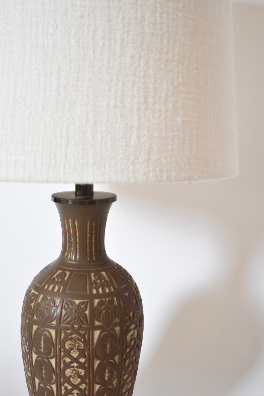 Low relief folliage pattern ceramic lamp, 1930s.