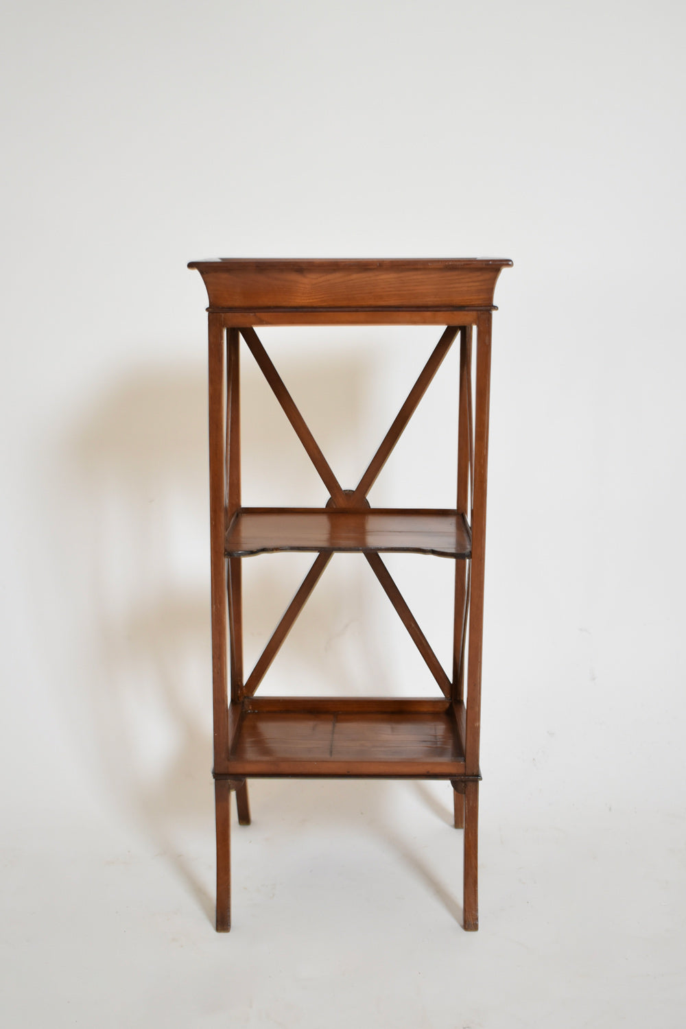 Pair of neoclassical mahogany bedside tables, 1960s.