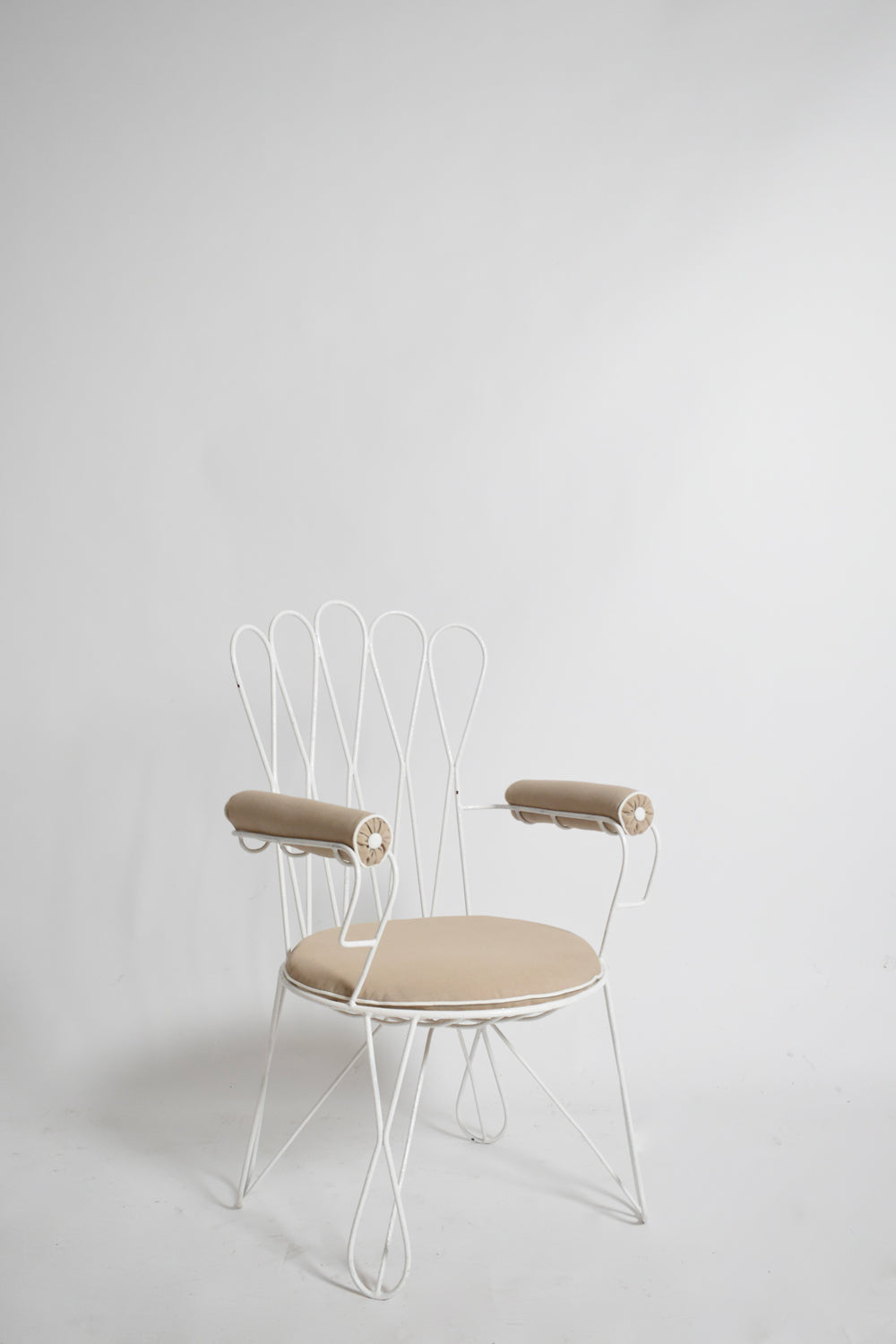 Pair of garden white wrought iron chairs, 1960s.