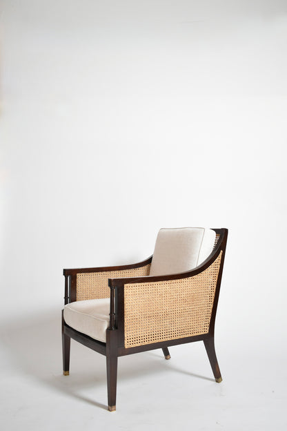 Pair of neoclassical wooden and caning armchairs, 1960s.