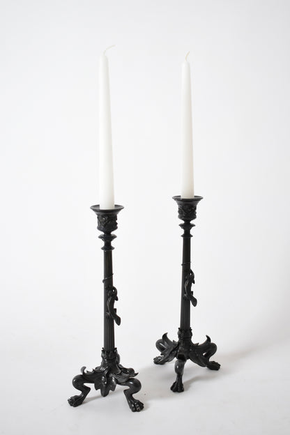 Set of four tripod zoomorphic bronze candleholders, XIXth c.