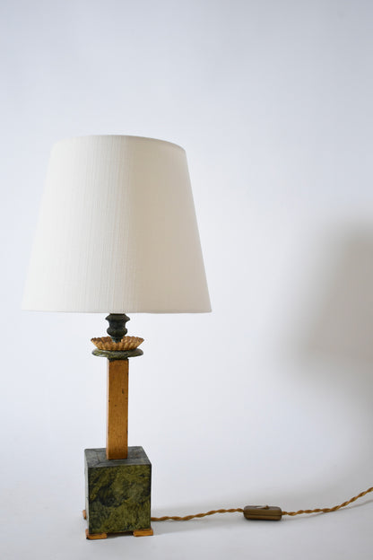 Pair of marble trompe l'oeil wooden lamps, 1940s.
