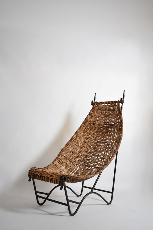 Wrought iron and rattan armchair, 1950s.