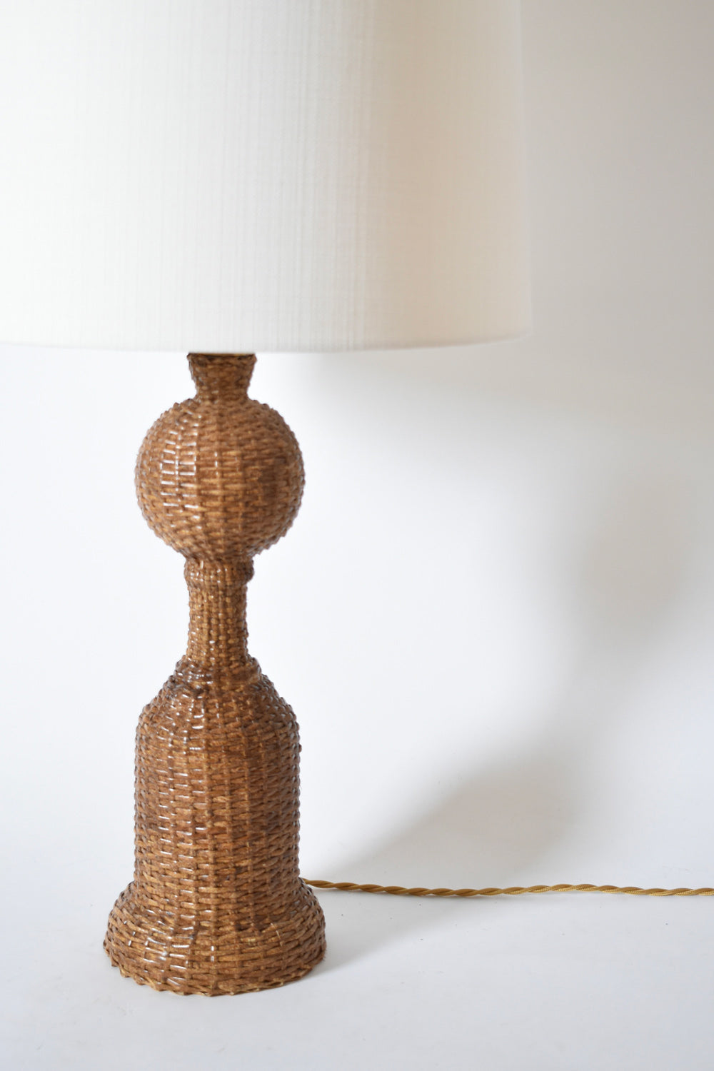 Rattan skin baluster table lamp, 1970s.